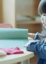 girl reading book 150x210 Teaching Lessons Through Picture Books