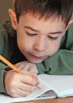 boy writing 150x210 Bravery Imagination Generosity Kids Magazine